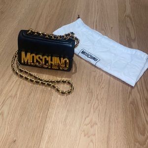 Moschino never been used mini purse